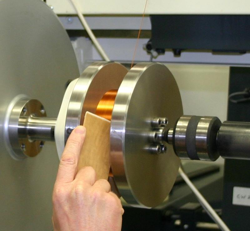 superconducting magnet winding oi